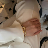 Elegante Nagelarmband in Gold